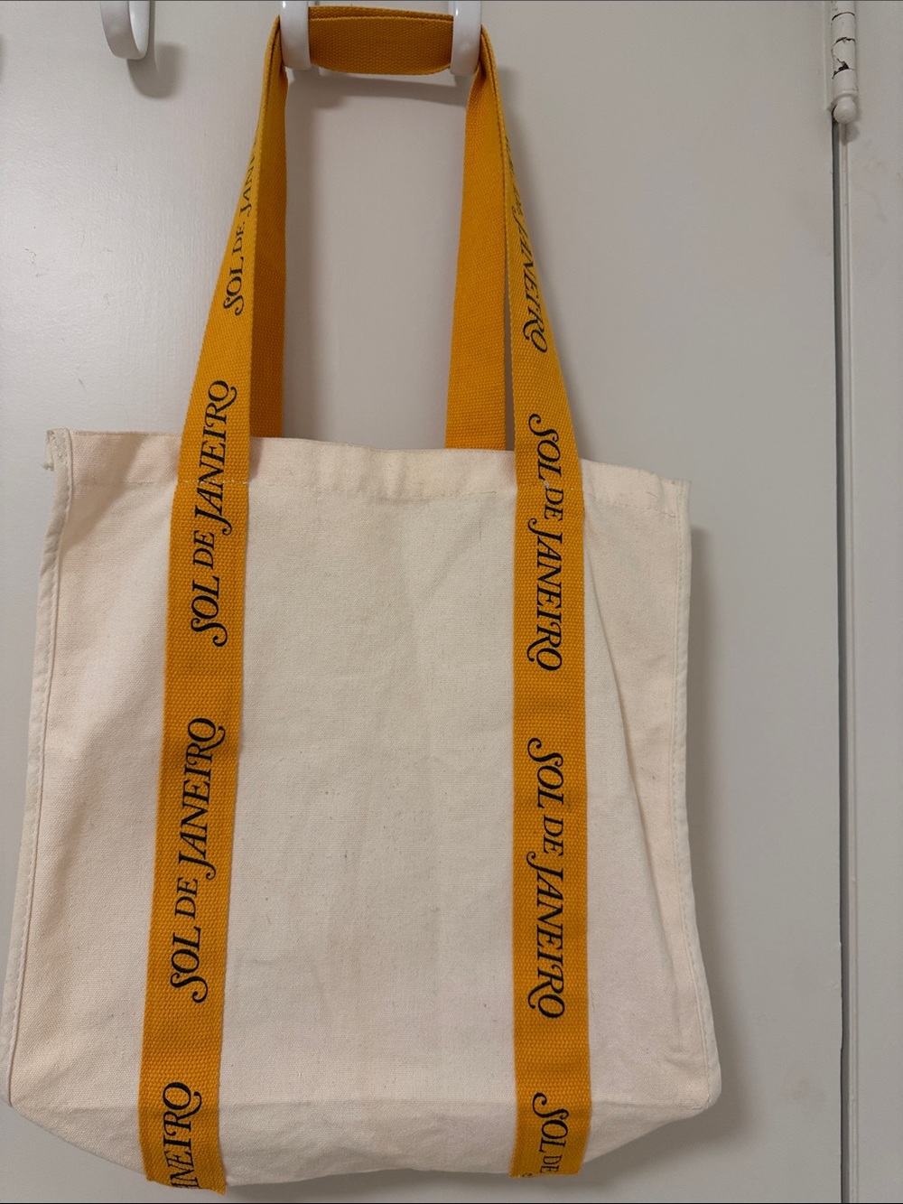 Sol de Janeiro Cream Canvas Tote with Yellow Logo Straps